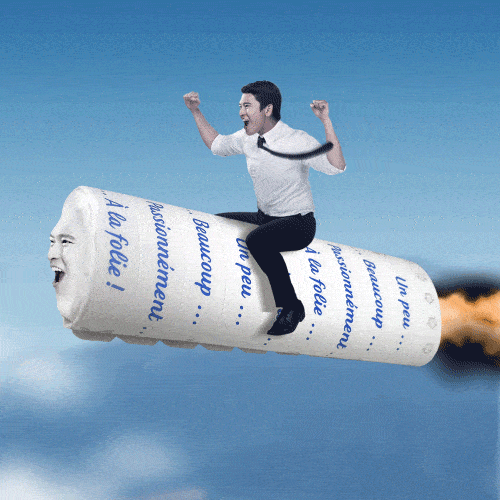 A man flies on a rocket.
