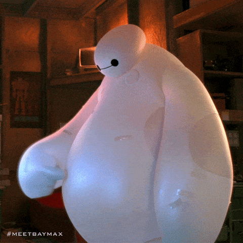 An inflatable ball is touching its stomach.