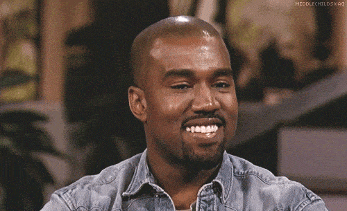 Kanye West smiles before showing a serious face