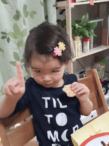 Little girl says no with her finger.