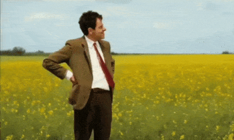 Gif of Mr Bean looking at his watch.