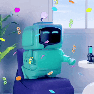 A robot is showered in confetti.